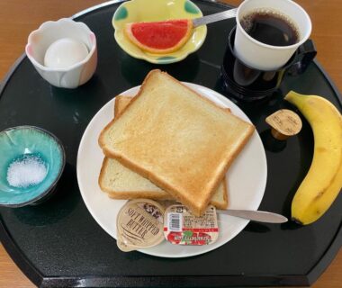 Breakfast tray with toast, banana, coffee and egg at Shōgetsu ryokan in Atami, Shizuoka