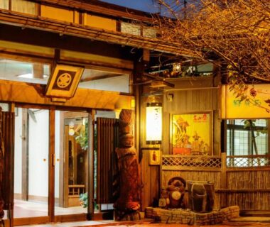 Warm wooden entrance with lanterns and traditional decor at Ryokufuen Kiyoharu in Gifu