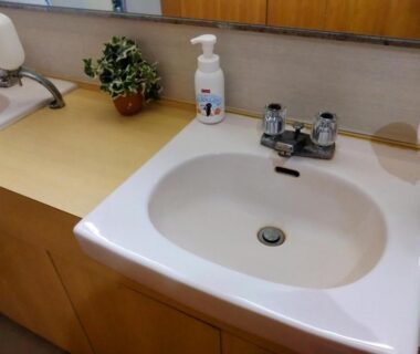 Ceramic sink with chrome faucet and soap dispenser at Ringoya Zaō Onsen Yamagata