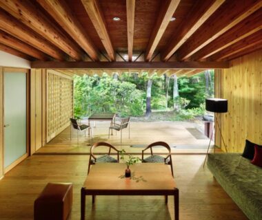 Spacious wood interior with low table and garden view at Nasu Muku no Ne, Tochigi