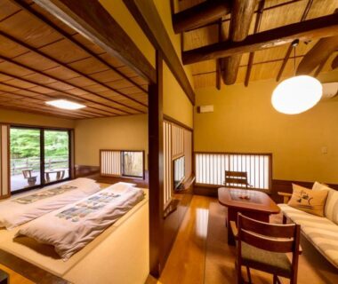 Tatami room with futon and low seating, Sato no Yu Waraku, Kumamoto, Kyushu