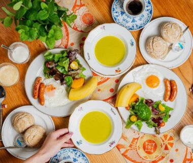 Breakfast table with soup bowls, salads, rolls and coffee at Okara Sansō in Nagano