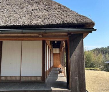 Thatched roof ryokan with wooden engawa, shoji doors and grassy courtyard at Kaze no Sawa Miyagi Tohoku