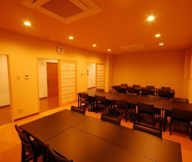 Japanese-style tatami dining area with tables and chairs at Koyasan Shukubo Zofukuin in Wakayama, Kansai