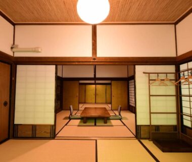 Traditional tatami room with low table, shoji screens and lantern at Koyasan Shukubo Hojoin, Wakayama