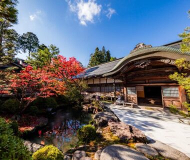 Ornamental garden and pond by Ekoin temple entrance at Koyasan in Wakayama, traditional wooden architecture