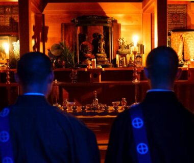 Two monks facing a temple altar inside Ekoin shukubo at Koyasan, Wakayama