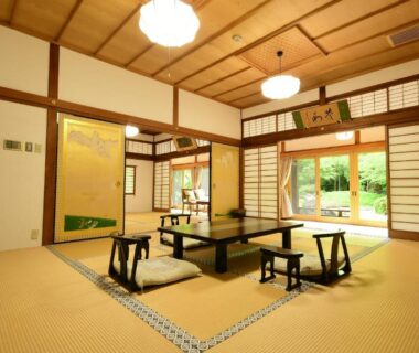 Traditional tatami room with low table and shoji doors at Koyasan Shukubo Sojiin, Wakayama